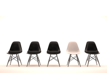 Schwarze Stuhlreihe mit weißem Stuhl