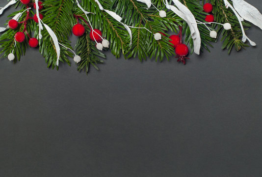 Elegant christmas background on black paper, top view