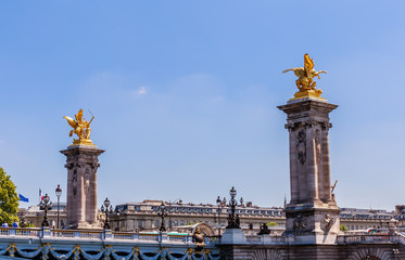 Fragment of the Alexander III Bridge across the Seine in Paris, France. View from the water