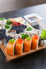 set of real classic Japanese sushi. on a wooden surface