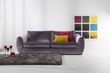 modern purple armchair and white wallpaper style