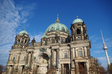 Fototapeta na wymiar Berliner Dom - cathedral in Berlin. Rich decorations and decorative sculptures of the facade of one of the most famous churches in Germany, the historic cathedral standing on the Museum Island.