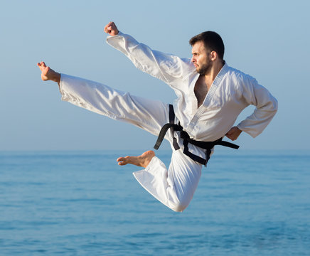 Young man shows his skills in karate