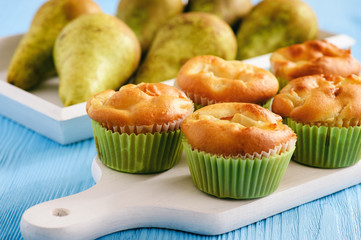 Homemade sweet muffins with pear stuffing.