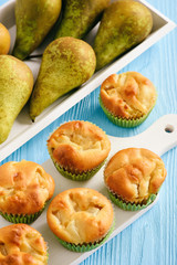 Homemade sweet muffins with pear stuffing.