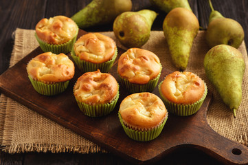 Homemade sweet muffins with pear stuffing.