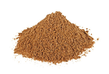 Heap of coriander powder on a white background
