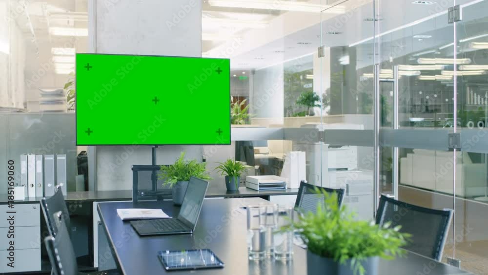 Aufkleber modern empty meeting room with big conference table with various documents and laptops on it, on the