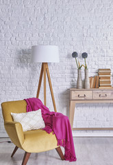 home stone wall interior yellow sofa and pink design