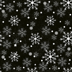 Seamless pattern of snowflakes on a black background. Snow falls background. Symbol winter, Merry Christmas holiday, Happy New Year celebration Vector illustration
