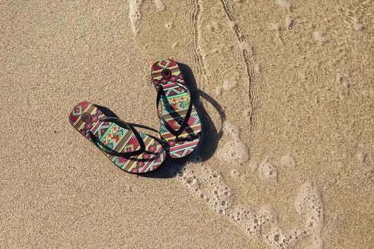 flip flops on the beach
