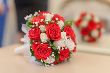 Beautiful bridal bouquet from white and red roses