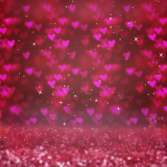 Fototapeta na wymiar Abstract blurred background with red hearts bokeh. The concept of Valentine's Day