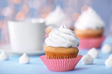 Delicious cupcake on table, closeup