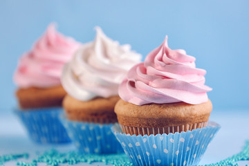 Delicious cupcake on table, closeup