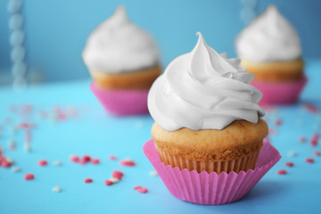 Delicious cupcake on table, closeup