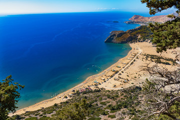 Obraz premium Tsambika beach with golden sand - view from Tsambika monastery (RHODES, GREECE)