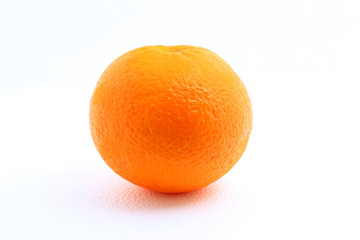 One mandarin orange shot over white background