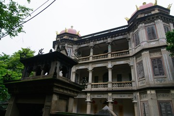 Abandoned ruined residential building. City.