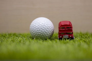 Red double decker bus for golfer in England