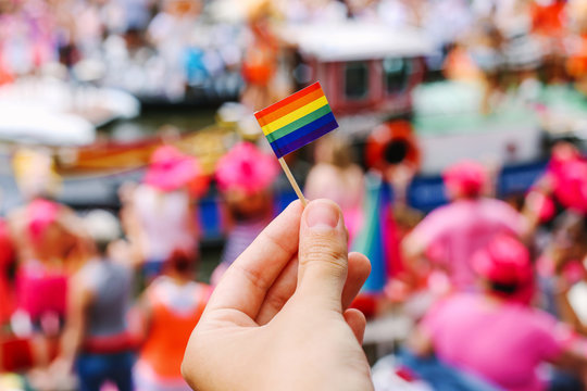 Close Up Person Holding Pride Flag