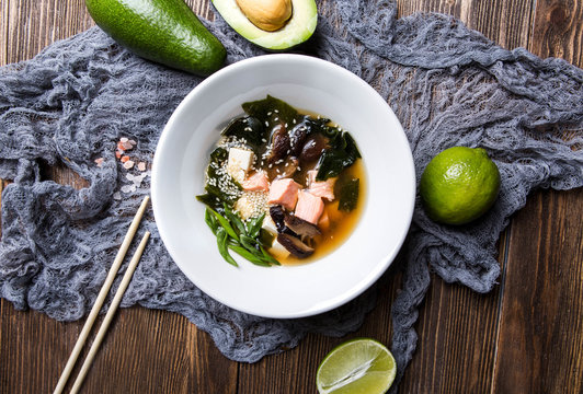 Japanese Miso Soup With Seafood On A Dark Wooden Background Top View