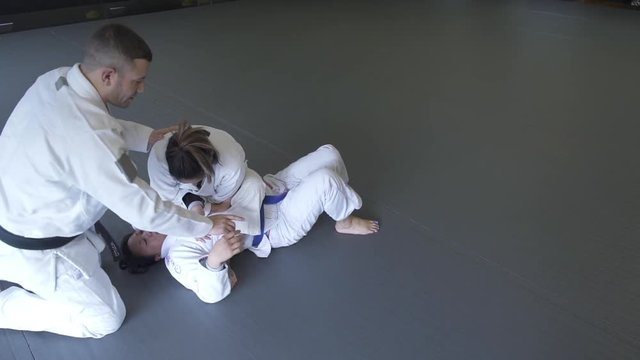 Instructor teaching Jiu-jitsu