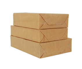 parcel wrapped with brown paper tied isolated on white background