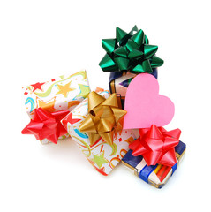 Pile of colorful gifts box on white studio background