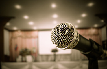 Microphones in seminar room, talking speech in conference hall light with microphone and keynote....