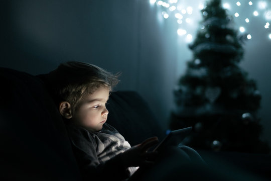 Little Boy Watching Cartoons on Tablet