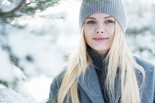 portrait of a beautiful young girl in winter