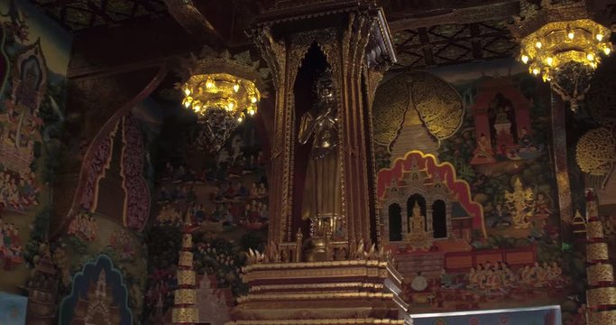 CHIANG MAI, THAILAND, MARCH 2017: Rotating view of Buddah statue inside Temple in chiang Mai
