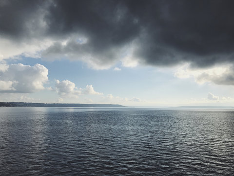 Overcast sky and calm waters of Puget Sound, Seattle, WA