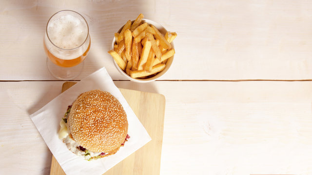 Top View Burger French, Fries And Beer  In Glass, Copy Space 