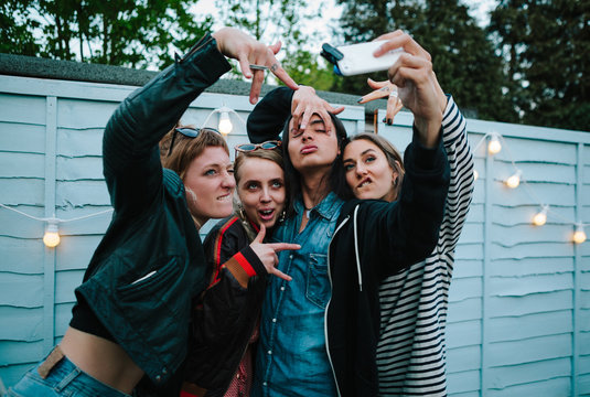 Young group taking a selfie on a summer evening