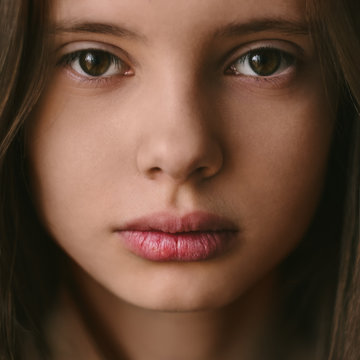 face of a beautiful young girl close-up
