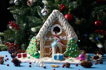 Gingerbread house with Christmas trees