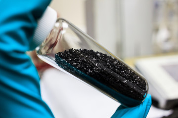 activated carbon or granular in clear bottle is used in air purification, decaffeinate, gold...