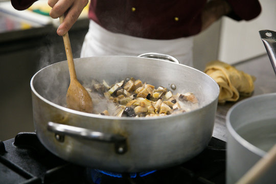 Cook doing traditional dish