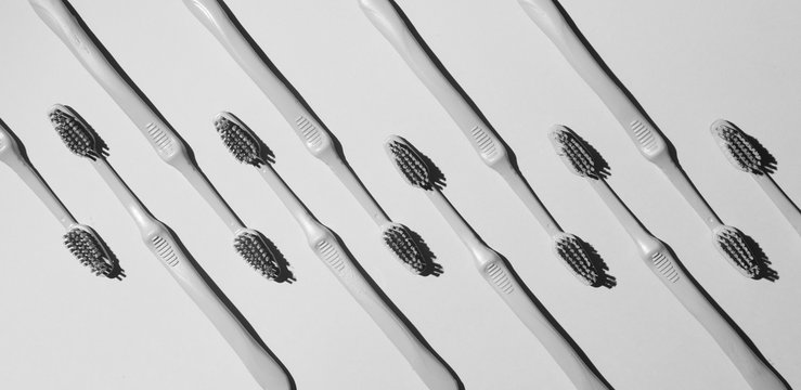 Arranged toothbrushes.