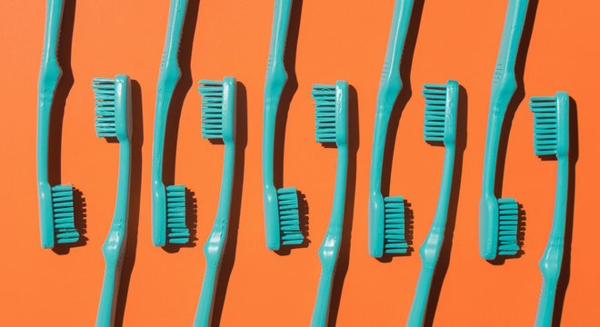 Arranged toothbrushes.