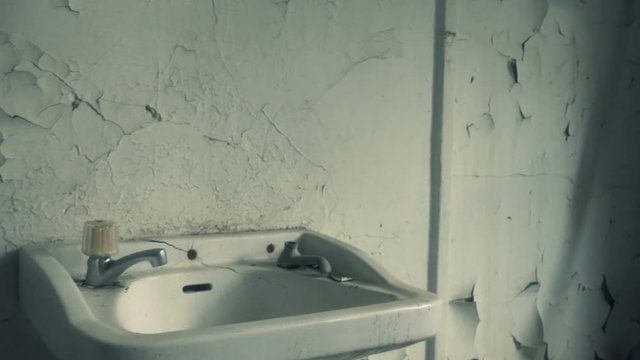 Wash basin in Ruins of psychiactric hospital