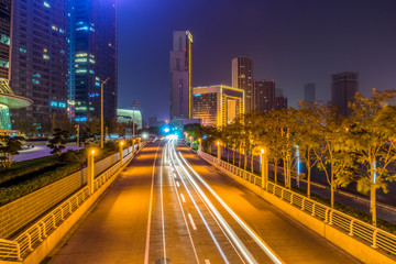 Fototapeta na wymiar traffic light through city at night in chin