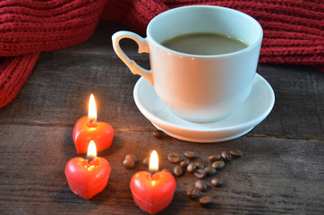 Coffee for Valentines day with candles heart shape and decorations