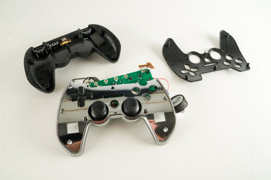 Broken Gamepad Joystick on white backrgound