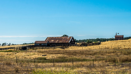 Rural life in California. Old ranch among the fields