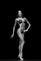 Fototapeta na wymiar fitness model posing in competitions