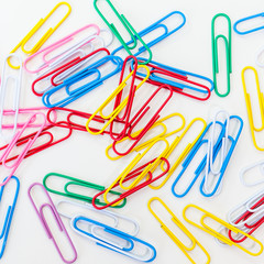 Metal paper clip isolated on a white background