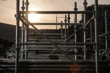 scaffolding material storage space at evening hours
